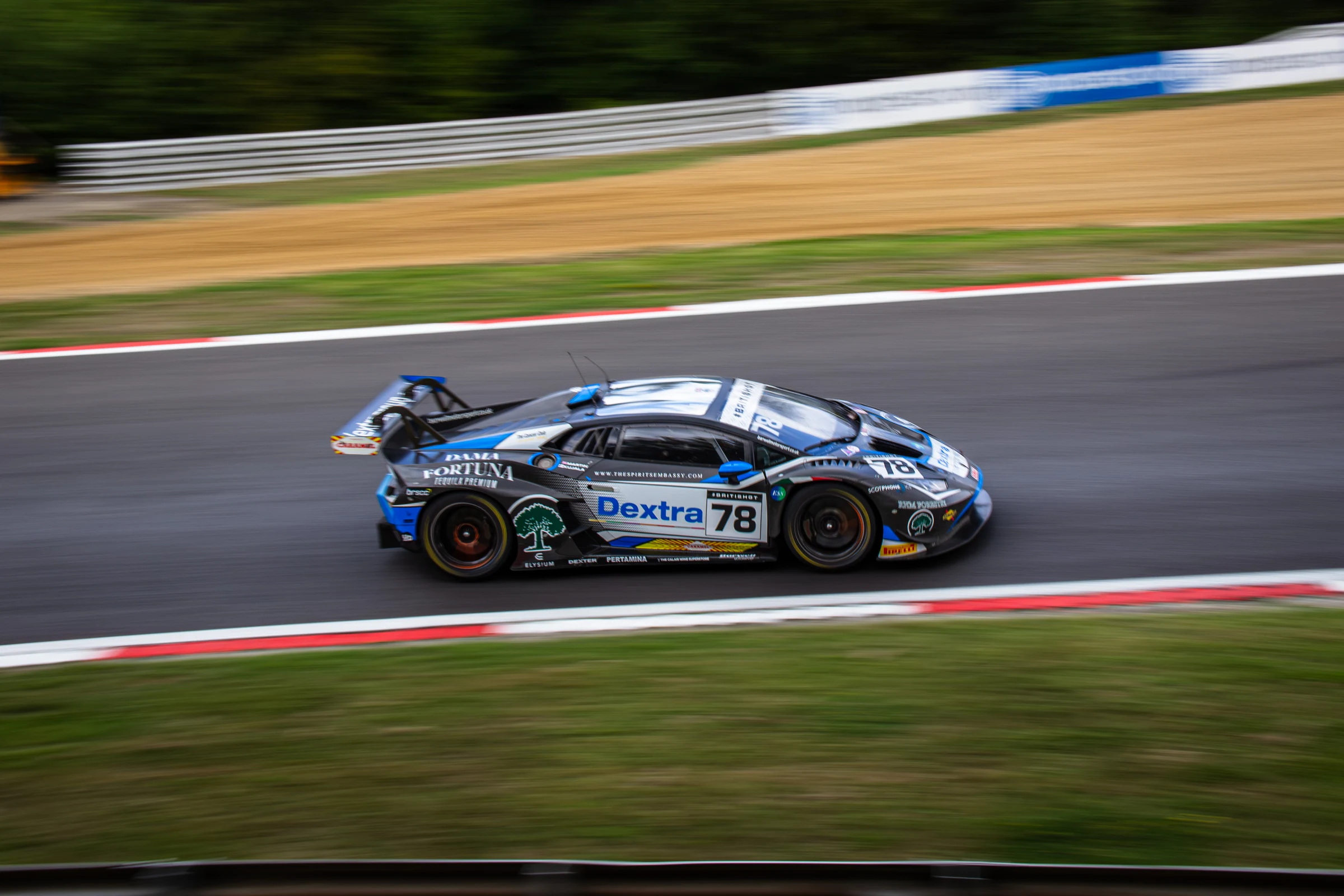 Blue number 78 Lamborghini racing at Brands Hatch