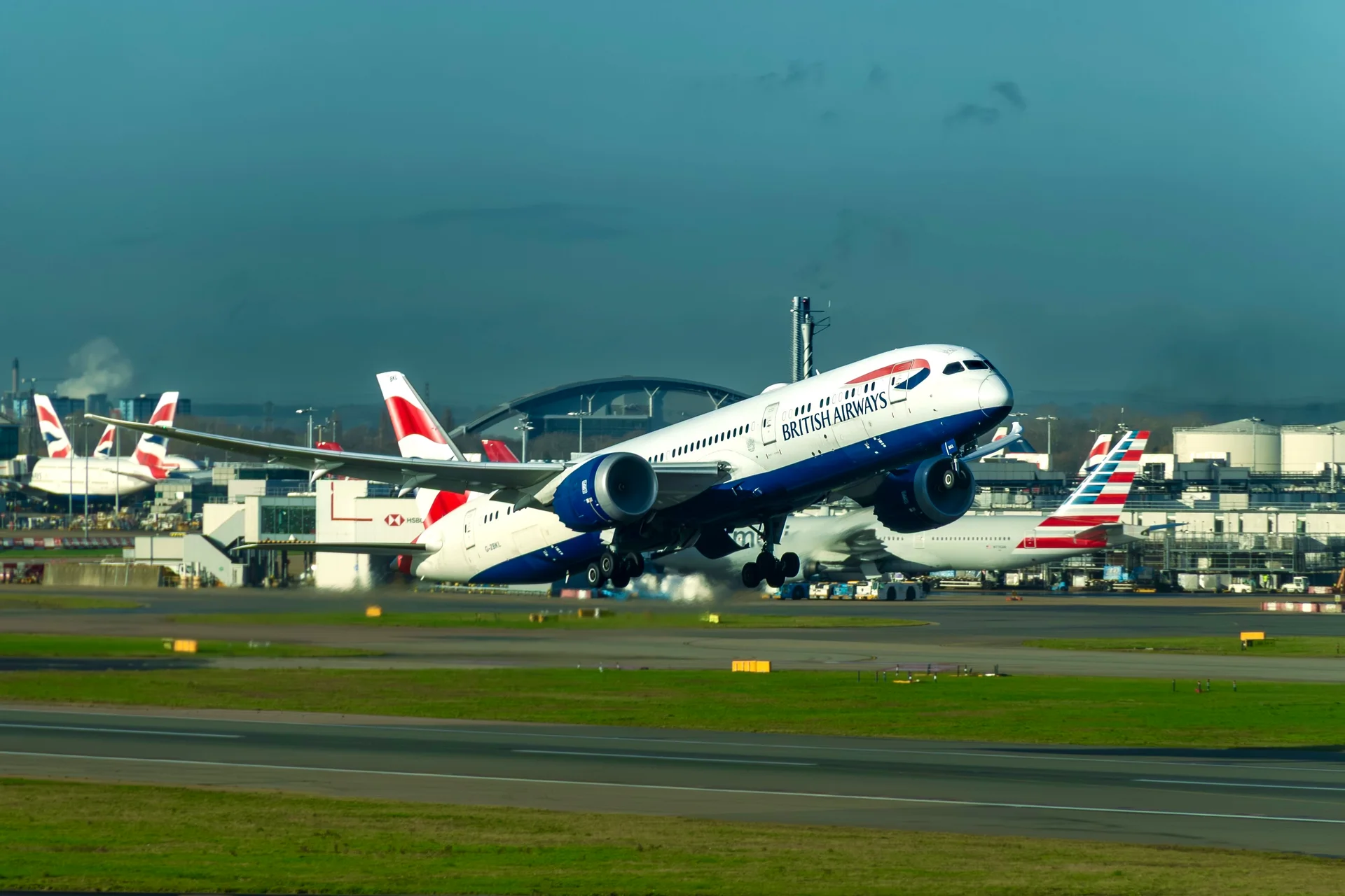 British Airways climbing above the runway
