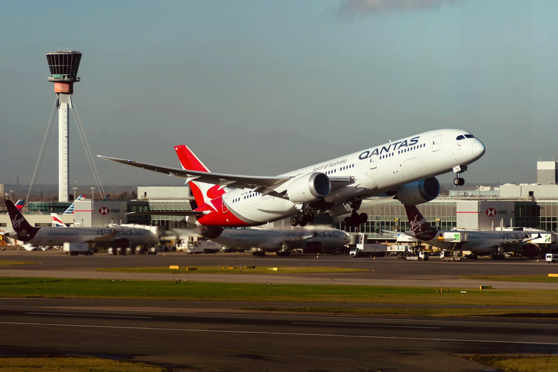 Qantas departing past the tower