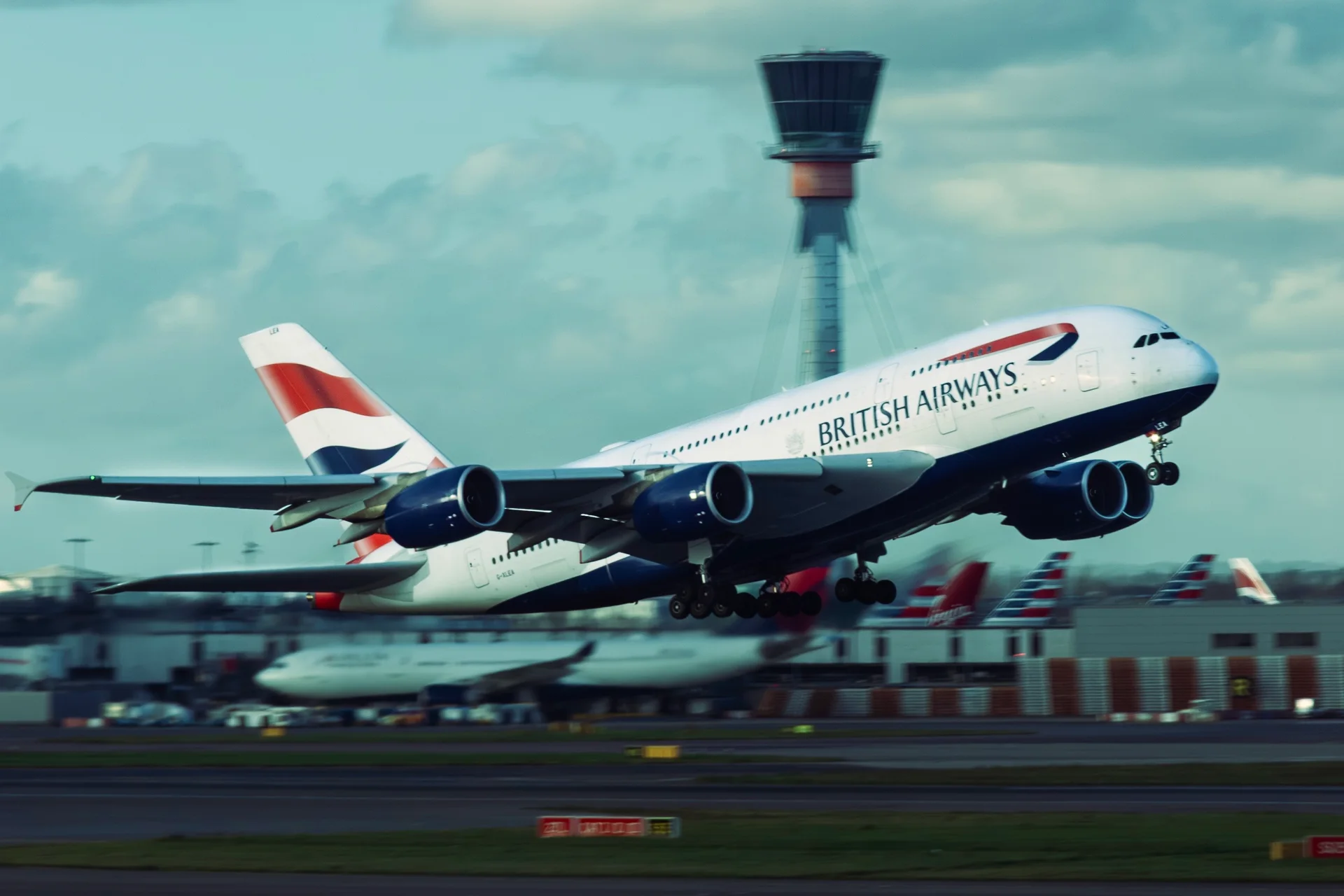 British Airways departure in turquoise light